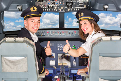 Cheap Flights Happy Pilots in the Cockpit with Thumbs Up